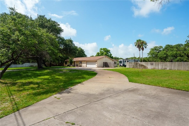 1689 Mooney Ln, Ingleside, TX 78362 - ranch-style home featuring concrete driveway and a garage