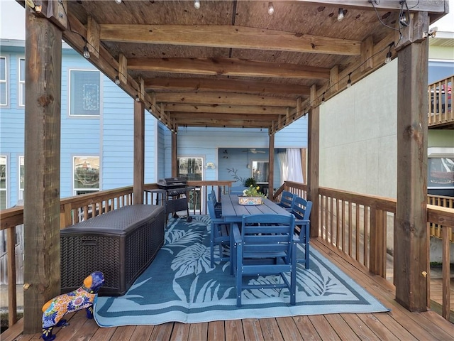 deck with outdoor dining space