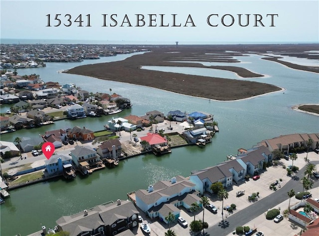 aerial view with a water view and a residential view