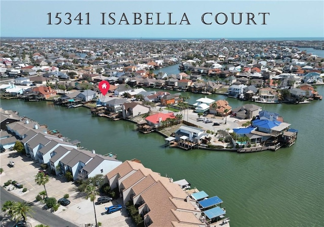 aerial view featuring a water view and a residential view