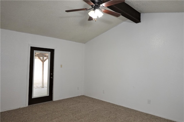 carpeted empty room with vaulted ceiling with beams, ceiling fan, and a textured ceiling