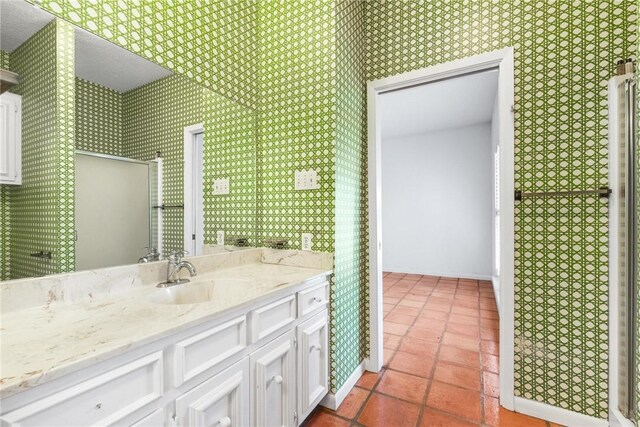 6002 Parkland Dr, Corpus Christi, TX 78413 - bathroom with vanity and tile patterned floors