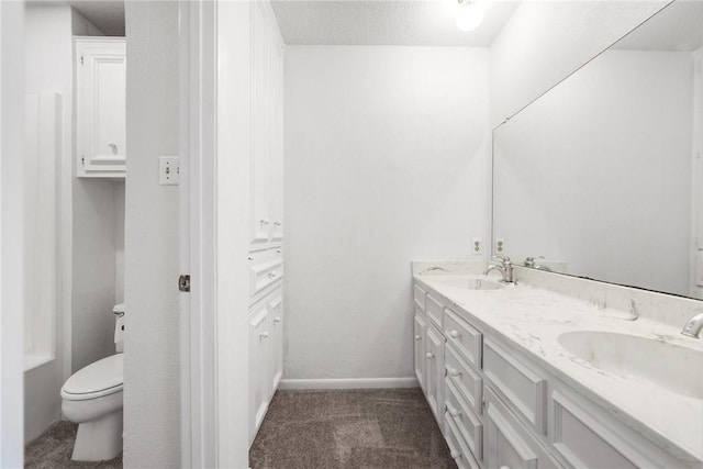 6002 Parkland Dr, Corpus Christi, TX 78413 - bathroom featuring vanity and toilet