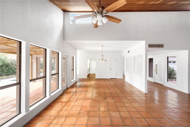 6002 Parkland Dr, Corpus Christi, TX 78413 - unfurnished living room featuring a towering ceiling and ceiling fan