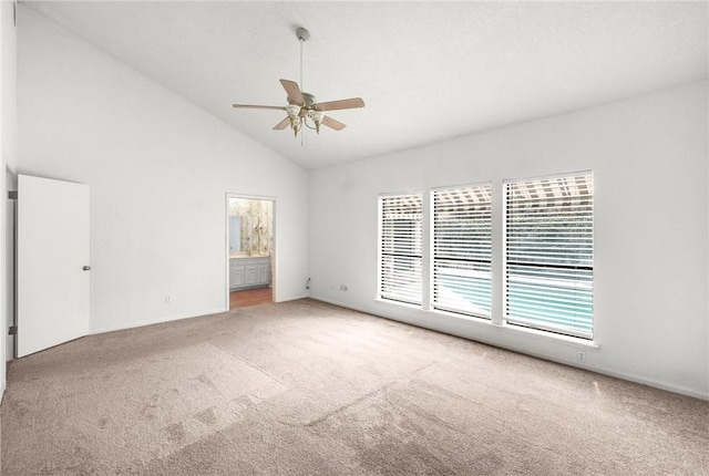 6002 Parkland Dr, Corpus Christi, TX 78413 - empty room with high vaulted ceiling, ceiling fan, and carpet
