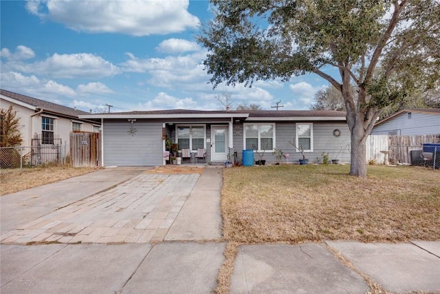 ranch-style house with a front lawn