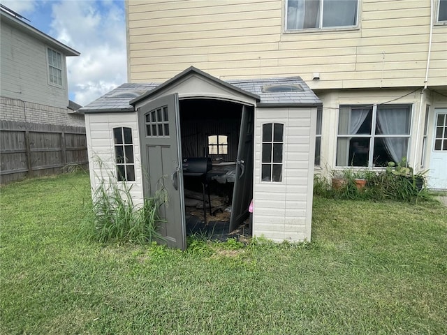 view of outdoor structure featuring a yard