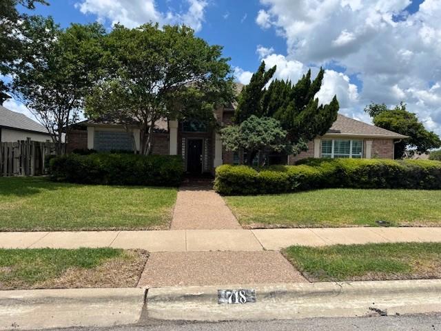 718 Broadway Blvd, Portland, TX 78374 - view of front of home with brick siding