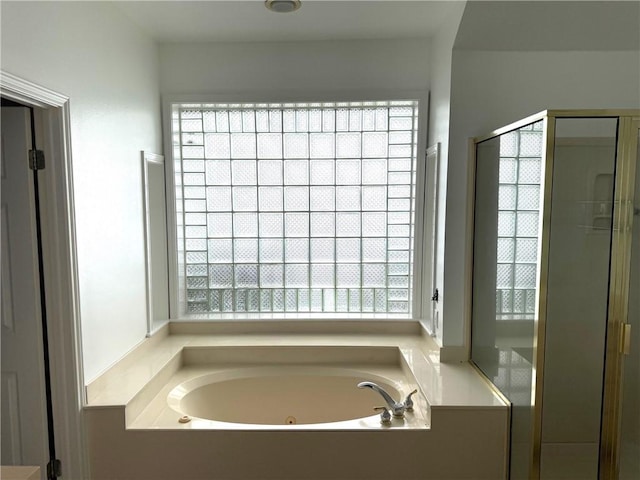 718 Broadway Blvd, Portland, TX 78374 - bathroom featuring a jetted tub and a shower stall
