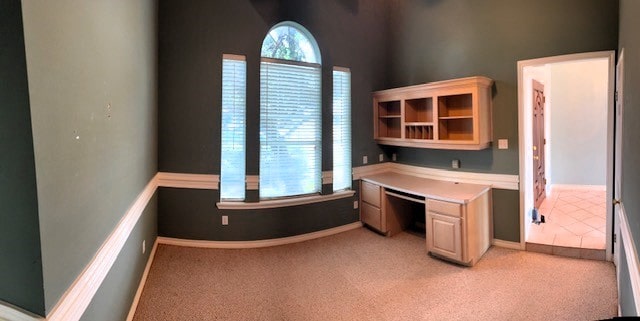 718 Broadway Blvd, Portland, TX 78374 - unfurnished office featuring built in study area, light colored carpet, and baseboards