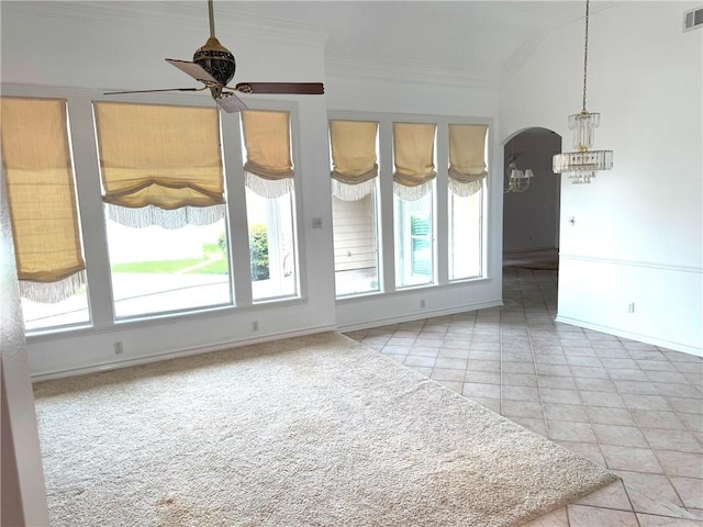 718 Broadway Blvd, Portland, TX 78374 - spare room featuring ceiling fan, arched walkways, plenty of natural light, crown molding, and a chandelier