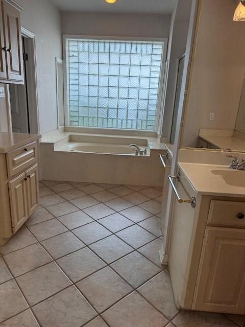 718 Broadway Blvd, Portland, TX 78374 - bathroom featuring vanity, tile patterned floors, and a garden tub