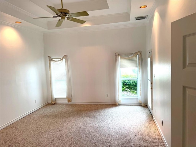 718 Broadway Blvd, Portland, TX 78374 - spare room with a raised ceiling, a ceiling fan, light carpet, and crown molding