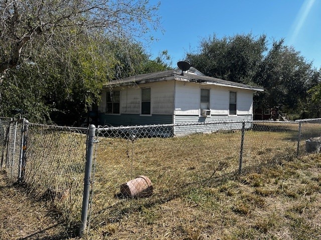 view of side of home with cooling unit