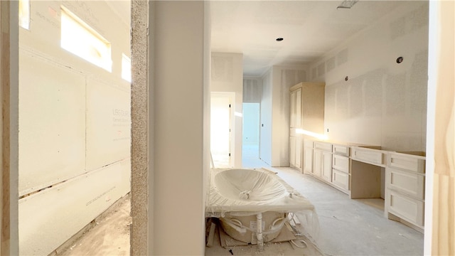 bathroom featuring concrete flooring