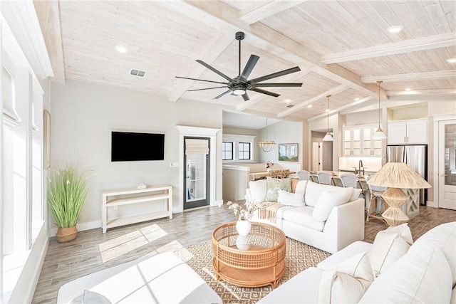 4903 State Highway 361 Unit 17, Port Aransas, TX 78373 - living room with wood ceiling, baseboards, light wood-type flooring, a ceiling fan, and recessed lighting