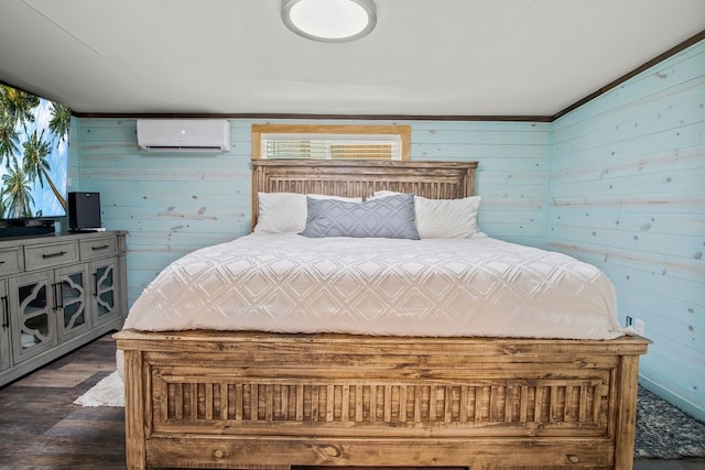 bedroom with dark wood-type flooring, wooden walls, and an AC wall unit