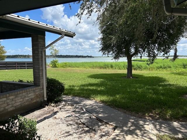 view of yard with a water view