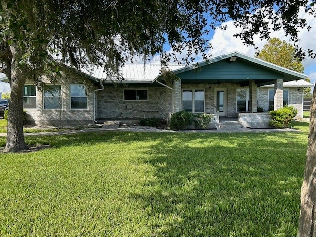 ranch-style house with a front yard