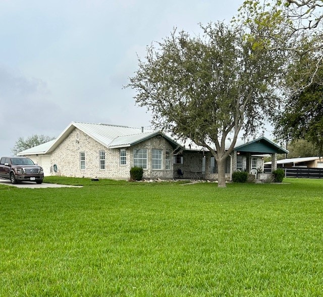 view of front of house with a front lawn