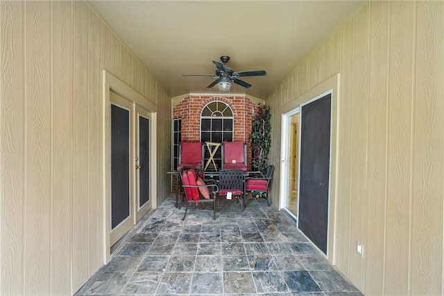 view of patio / terrace featuring ceiling fan