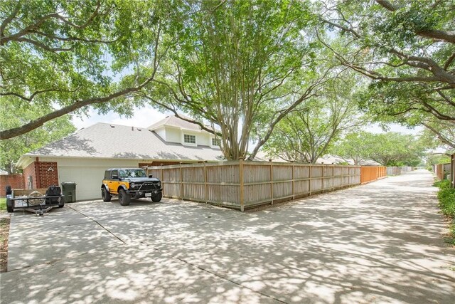 5918 Woodmere Dr, Corpus Christi, TX 78414 - view of patio / terrace featuring a garage