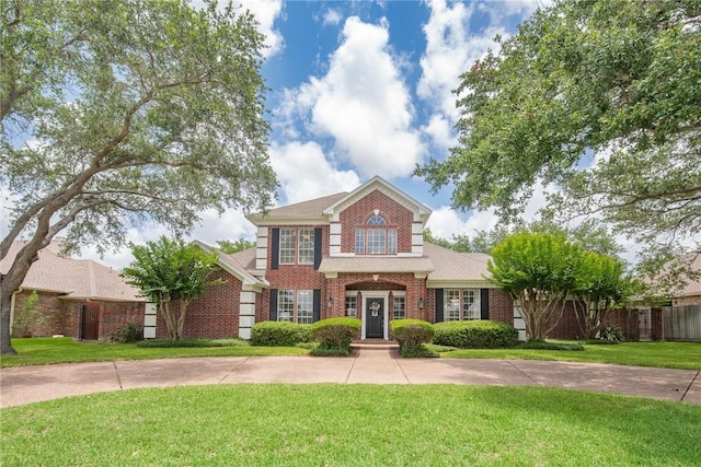 5918 Woodmere Dr, Corpus Christi, TX 78414 - colonial house with brick siding