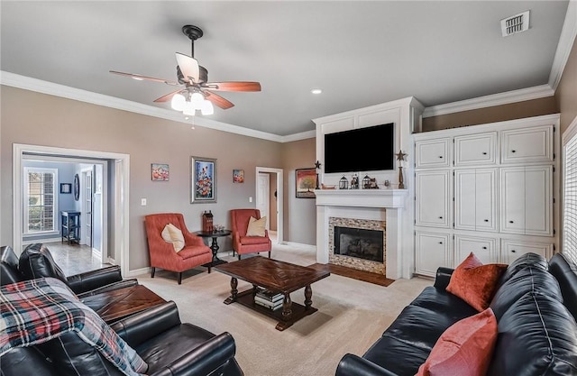 5918 Woodmere Dr, Corpus Christi, TX 78414 - living area featuring crown molding, a ceiling fan, a glass covered fireplace, baseboards, and recessed lighting