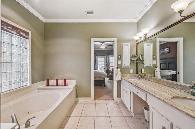 5918 Woodmere Dr, Corpus Christi, TX 78414 - ensuite bathroom with double vanity, a whirlpool tub, crown molding, tile patterned floors, and ceiling fan
