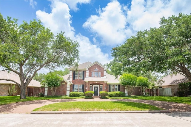 5918 Woodmere Dr, Corpus Christi, TX 78414 - colonial inspired home featuring brick siding