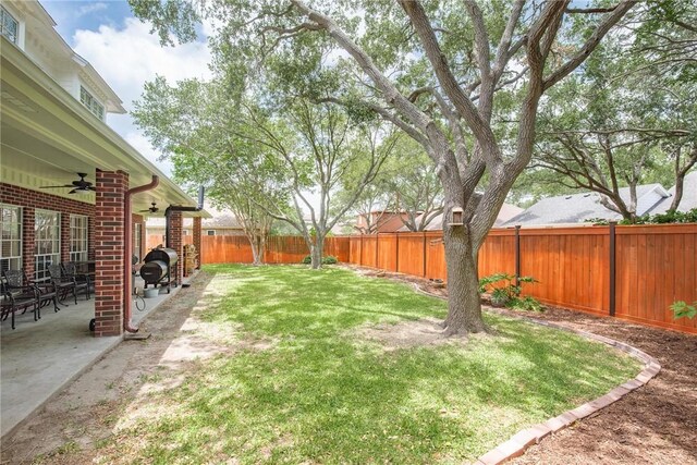 5918 Woodmere Dr, Corpus Christi, TX 78414 - view of yard featuring ceiling fan and a patio