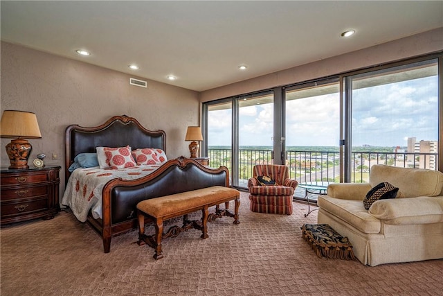 4500 Ocean Dr Unit 9A, Corpus Christi, TX 78412 - carpeted bedroom with access to exterior and recessed lighting
