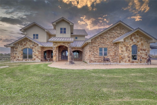 view of front of home featuring a yard