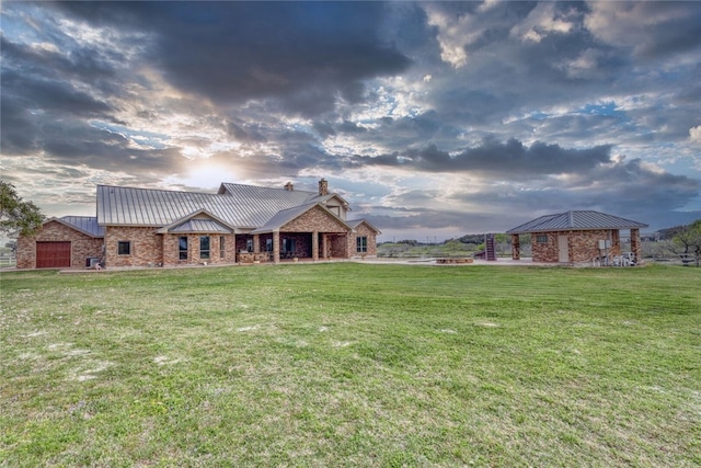 view of front of home featuring a gazebo and a yard