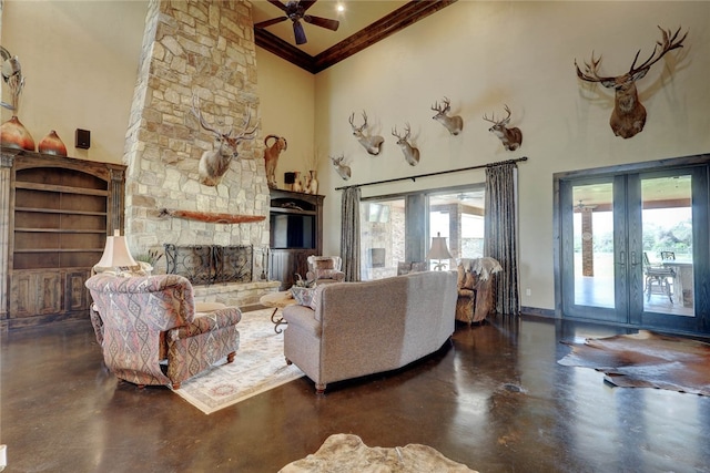 living room with high vaulted ceiling, french doors, ceiling fan, ornamental molding, and a fireplace