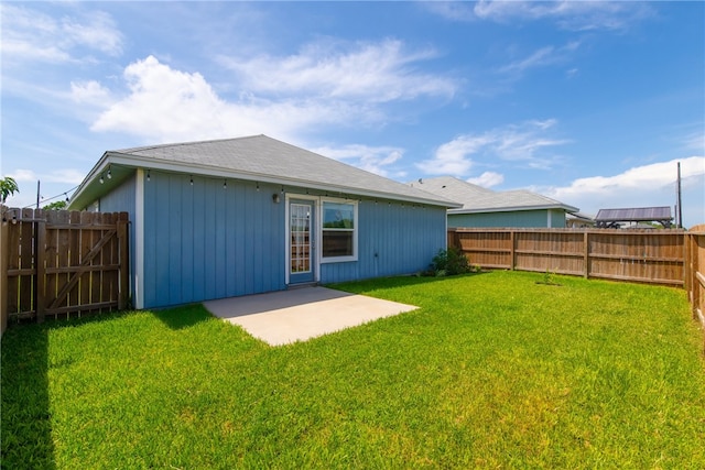 6734 Mikayla St, Corpus Christi, TX 78413 - rear view of house featuring a fenced backyard and a patio area