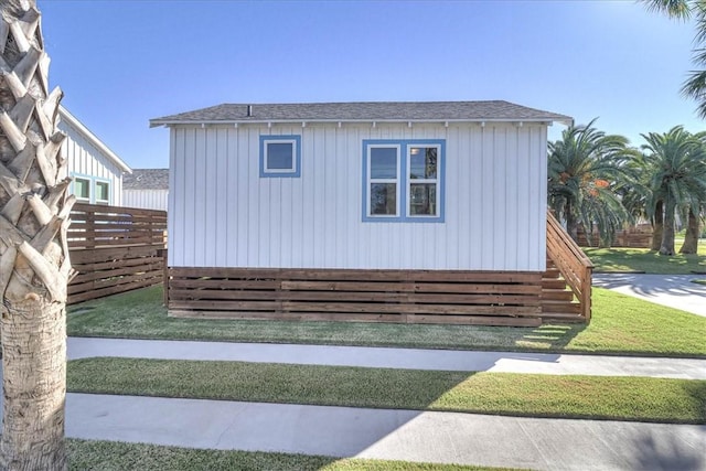 view of home's exterior featuring a yard