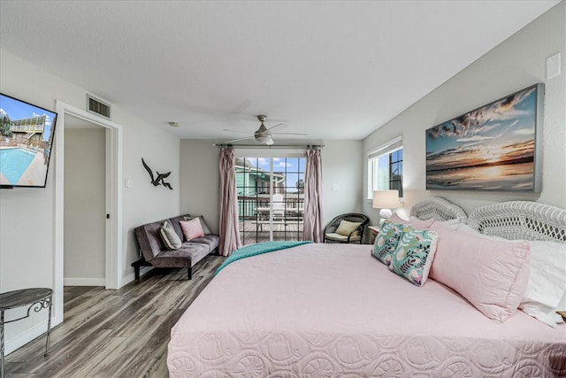 bedroom with hardwood / wood-style floors and ceiling fan