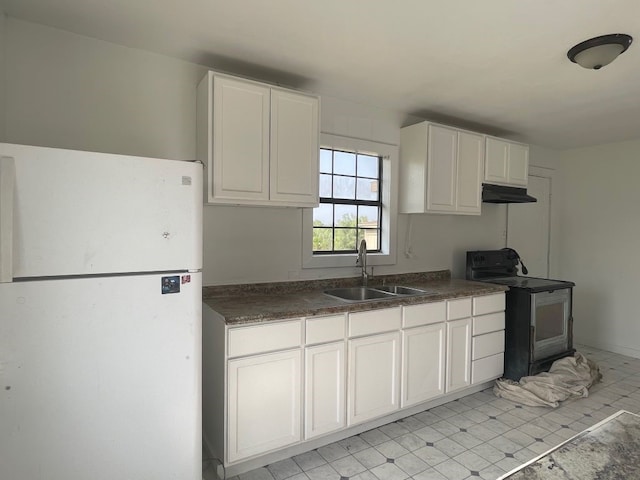 kitchen featuring white cabinetry, sink, white refrigerator, and electric stove