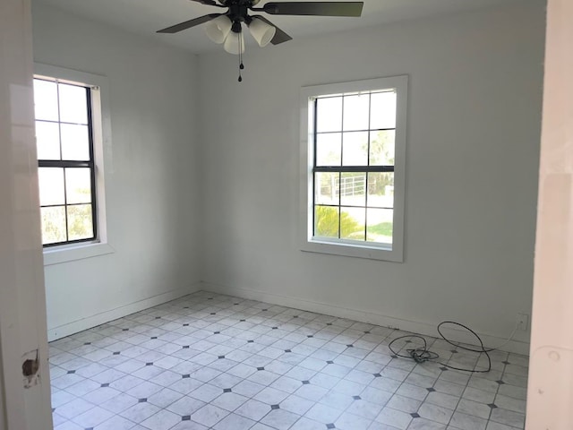 unfurnished room featuring ceiling fan