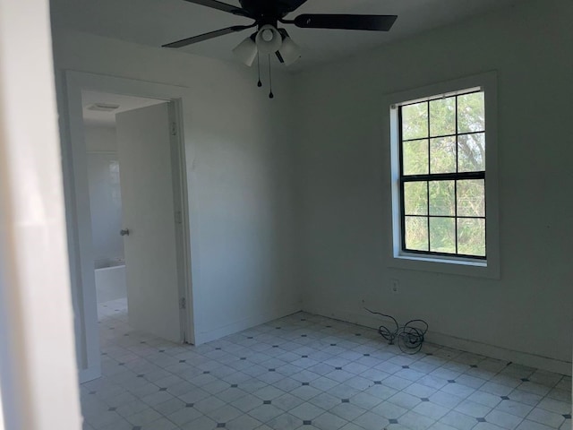 unfurnished room featuring ceiling fan