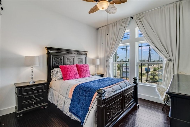 602 Banyan Beach Dr, Port Aransas, TX 78373 - bedroom featuring dark wood-style flooring and ceiling fan