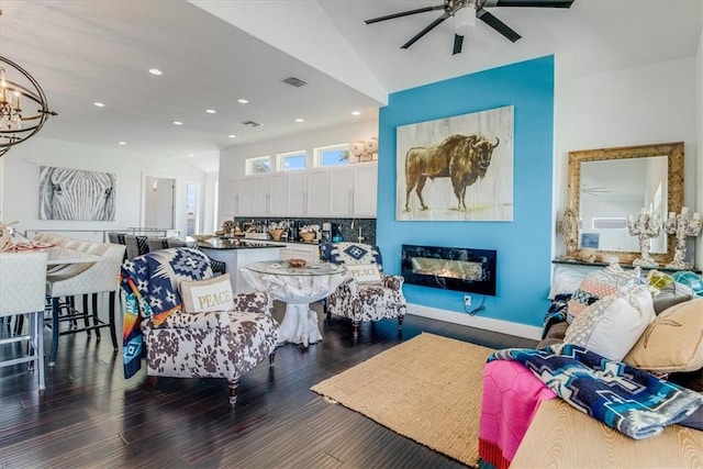 602 Banyan Beach Dr, Port Aransas, TX 78373 - living area with a glass covered fireplace, a ceiling fan, wood finished floors, and recessed lighting