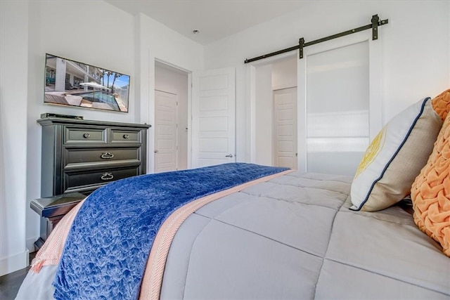 602 Banyan Beach Dr, Port Aransas, TX 78373 - bedroom featuring a barn door