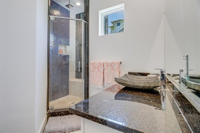 602 Banyan Beach Dr, Port Aransas, TX 78373 - bathroom featuring a shower stall and vanity