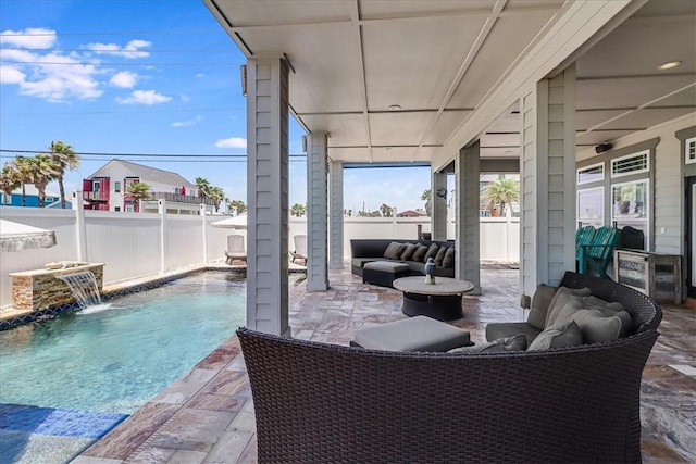 602 Banyan Beach Dr, Port Aransas, TX 78373 - fenced backyard featuring an outdoor hangout area and a patio