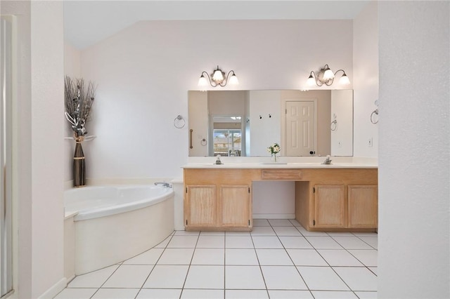 1025 Pompano Dr, Aransas Pass, TX 78336 - bathroom with a garden tub, double vanity, lofted ceiling, and tile patterned floors