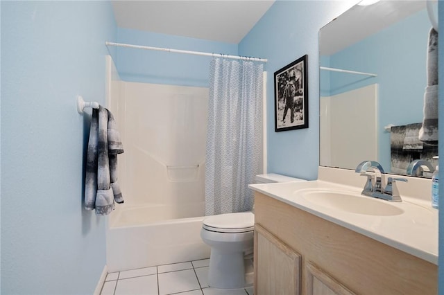 1025 Pompano Dr, Aransas Pass, TX 78336 - bathroom featuring tile patterned floors, vanity, and shower / bath combo with shower curtain