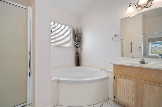 1025 Pompano Dr, Aransas Pass, TX 78336 - bathroom with a garden tub, a shower stall, vanity, and tile patterned floors
