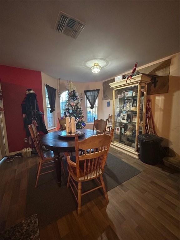 dining room with hardwood / wood-style floors